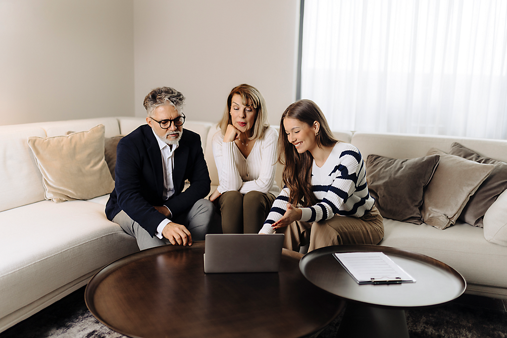Pre-retirement couple reviewing financial plans and debt obligations.