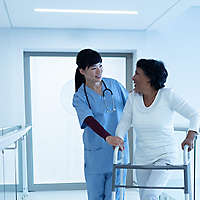 Nurse walking with patient