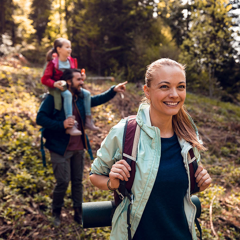 A family of 3 hiking