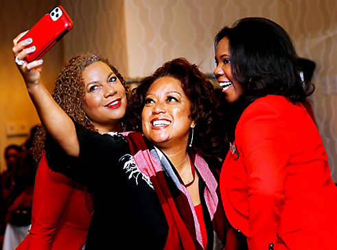 Group of women taking a picture of them