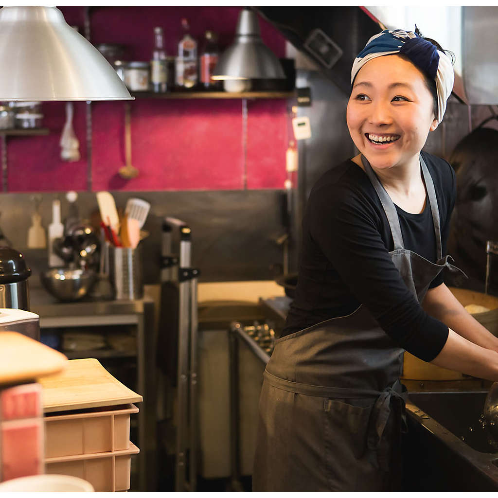 Small business owner working in her kitchen