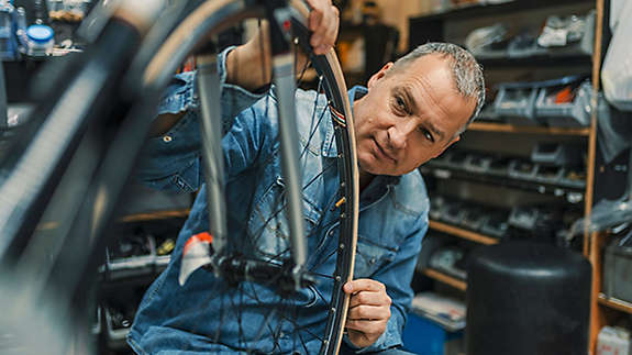 Man working in bicycle shop