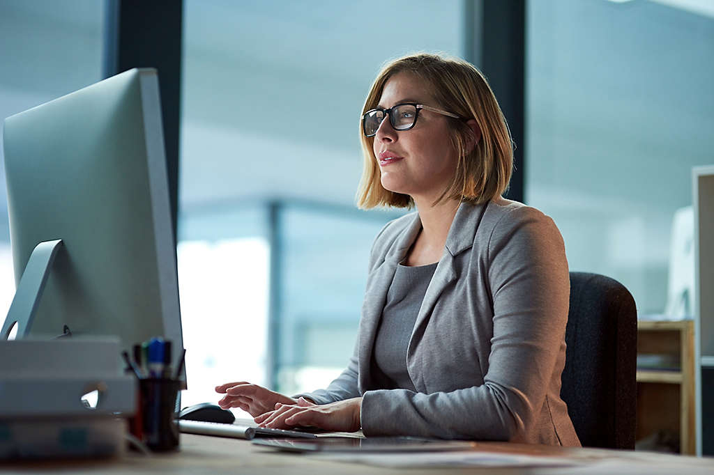 Cropped shot of a businesswoman working late at night in her office