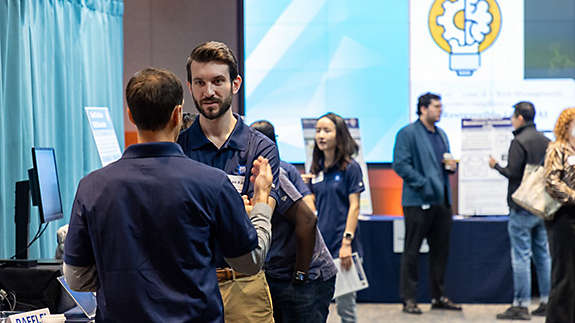 Employees at the data science expo