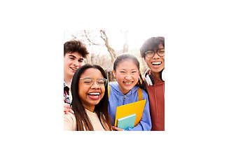 happy group of teenagers smiling