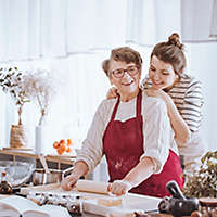 grandmother-and-granddaughter-baking-1x1