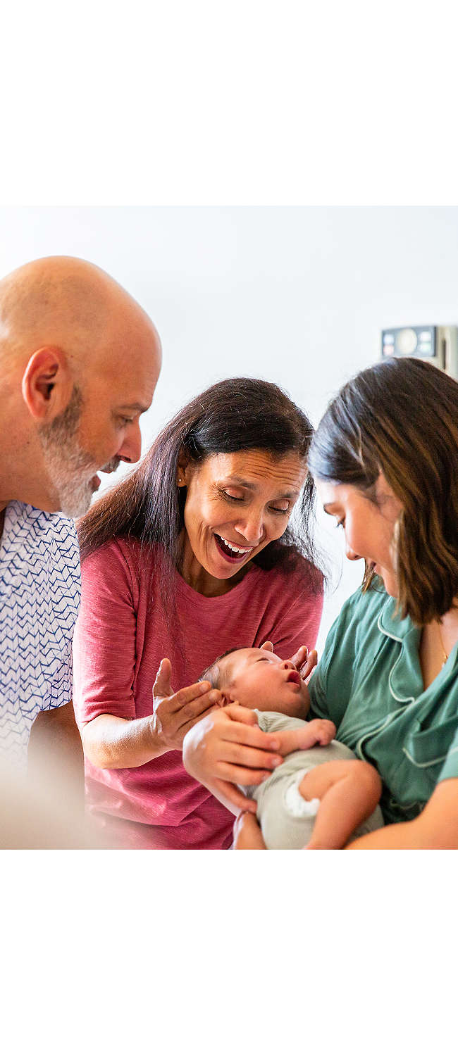 grandparents get to meet their new baby grandson