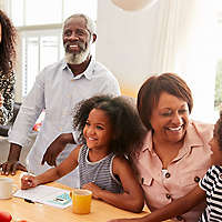 Family having breakfast in kitchen