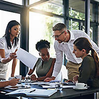 Office workers around table