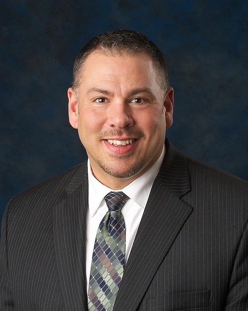 Headshot of Luke  C. Finchem