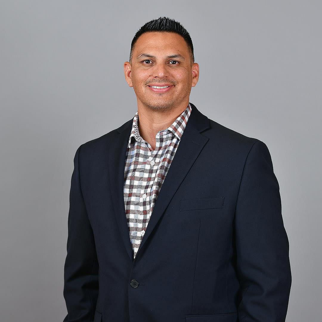 Headshot of Adam Sheldon