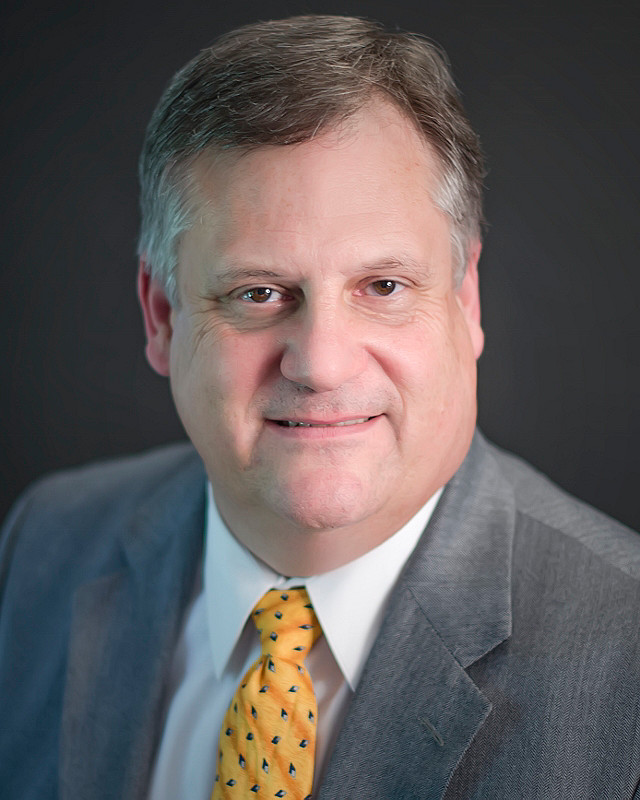 Headshot of Richard Dennie