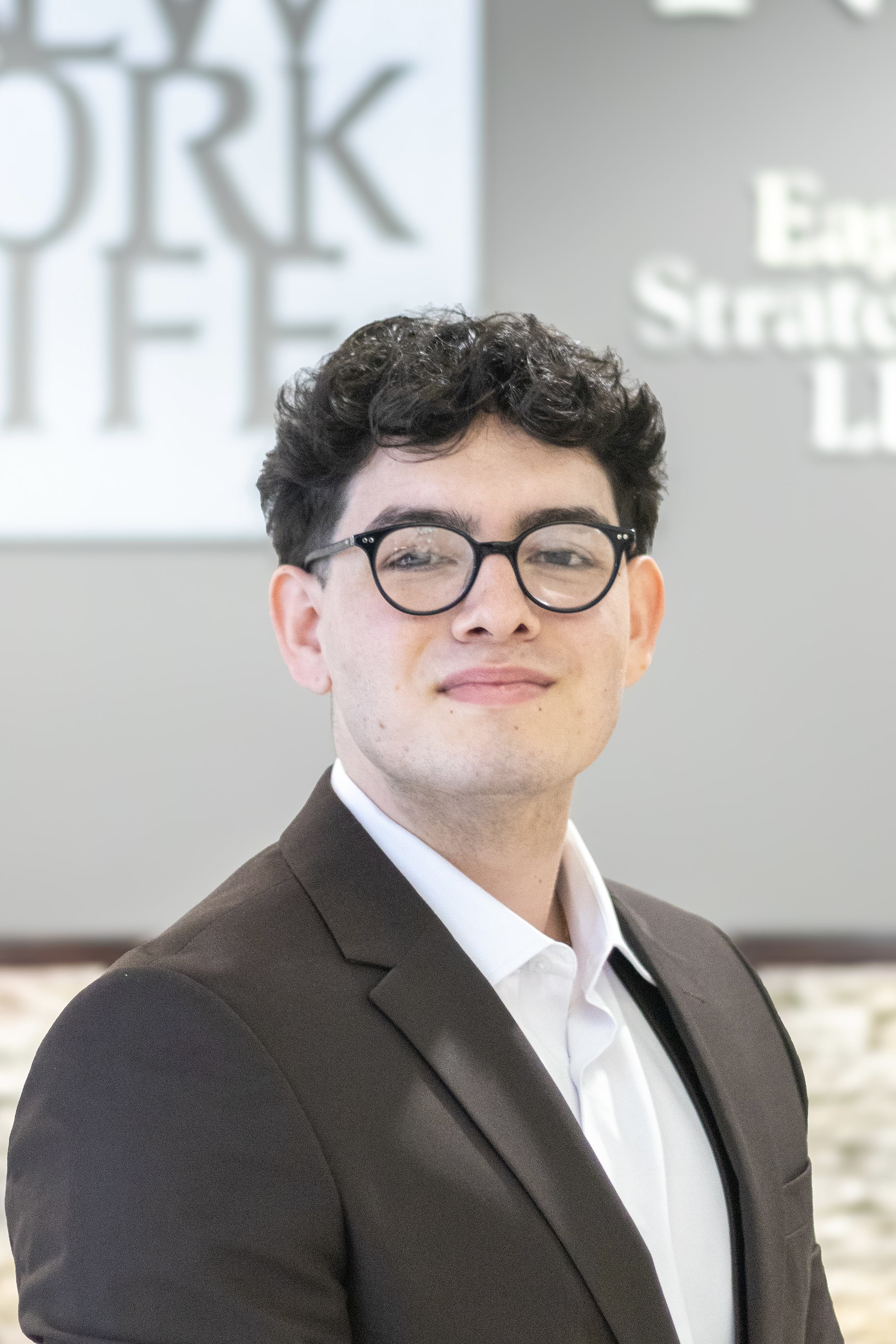 Headshot of Joshua D. Miguez-Ponce