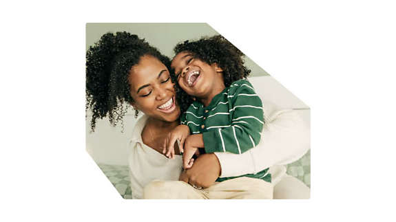 Mother and Child hugging and laughing