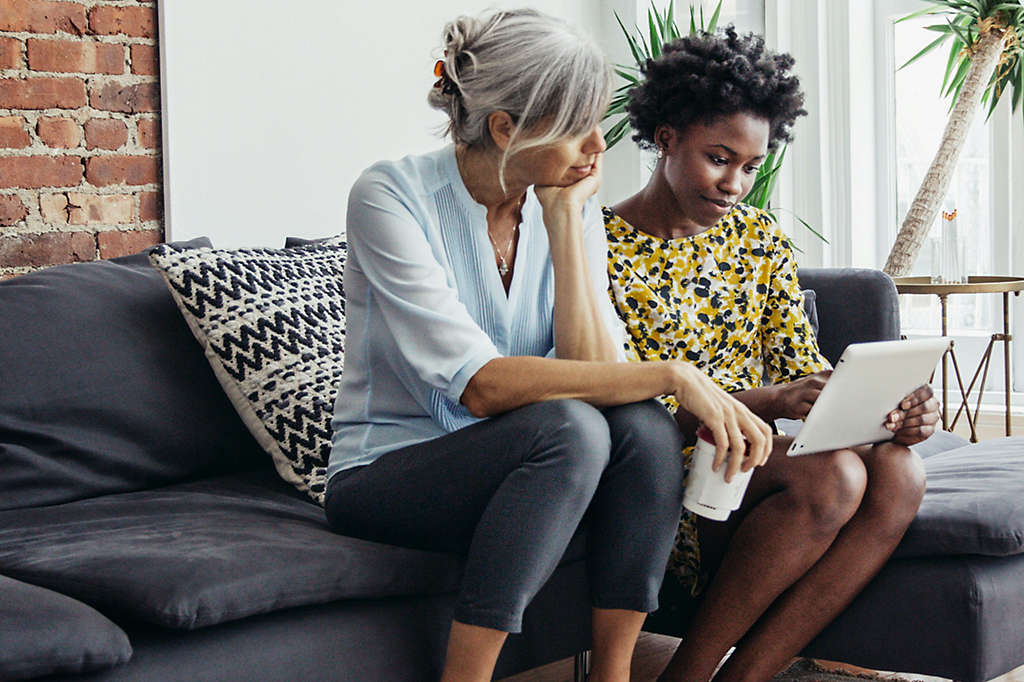 Two people reviewing notes