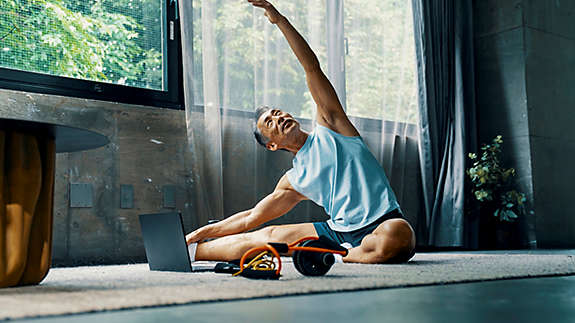 Older man stretching to keep in shape