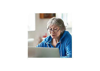senior woman working on laptop