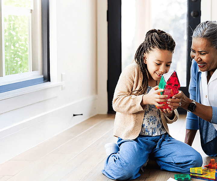 Grandmother playing with grandchild