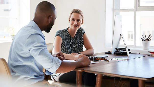 Man and women having a meeting