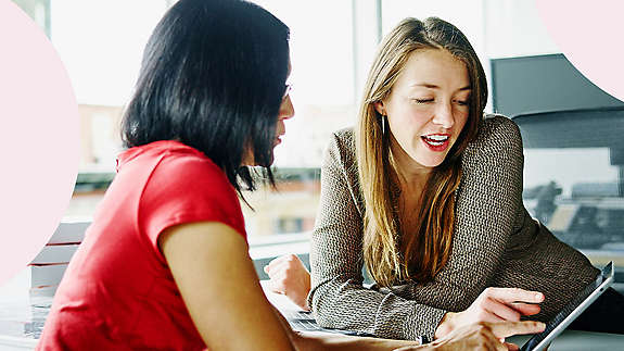 Two financial professional discuss life insurance